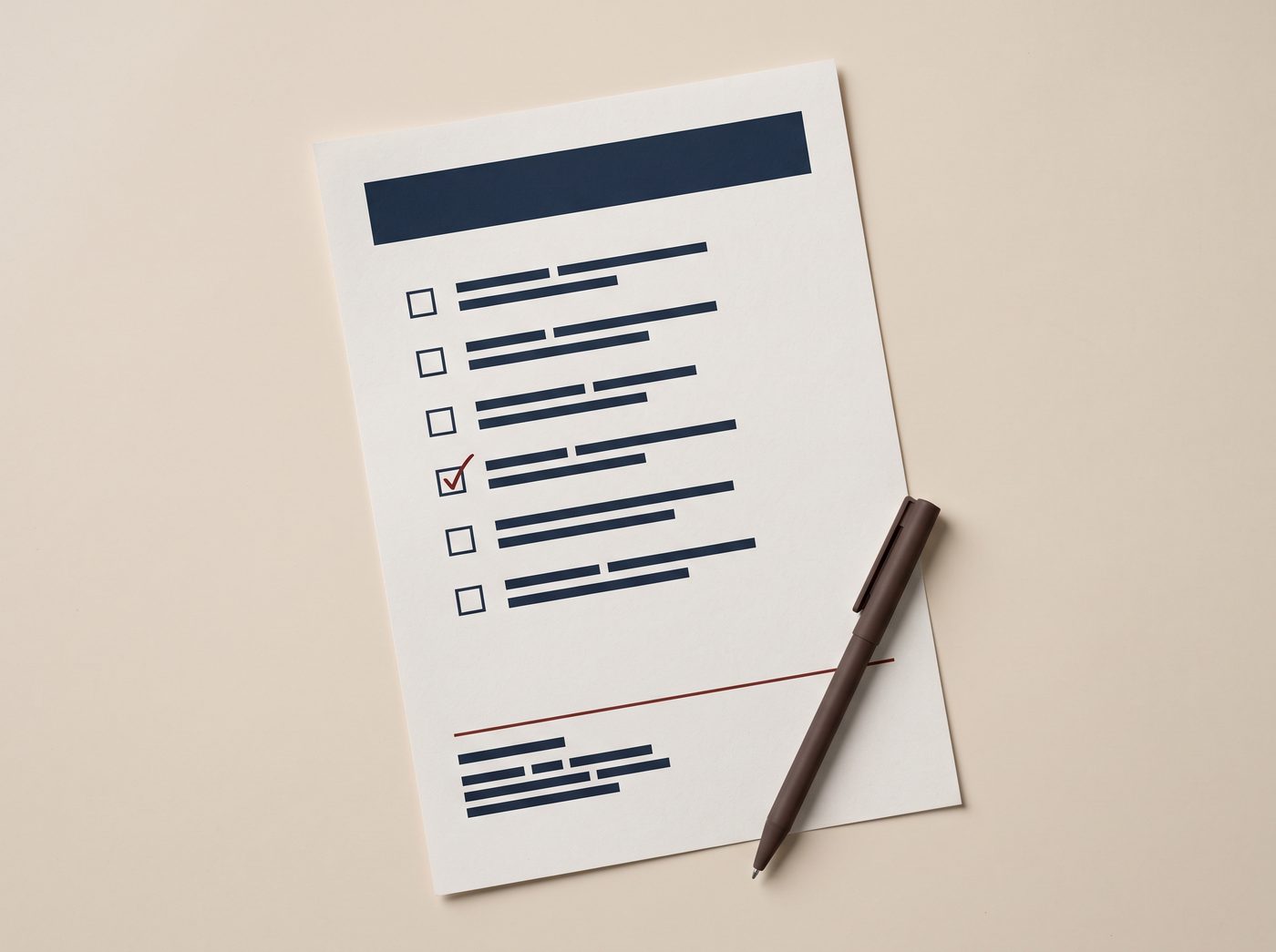 A printed checklist with checkboxes, one checked in red, and a pen resting beside it