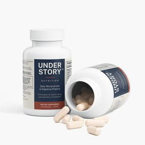 Bottle tipped with capsules spilling